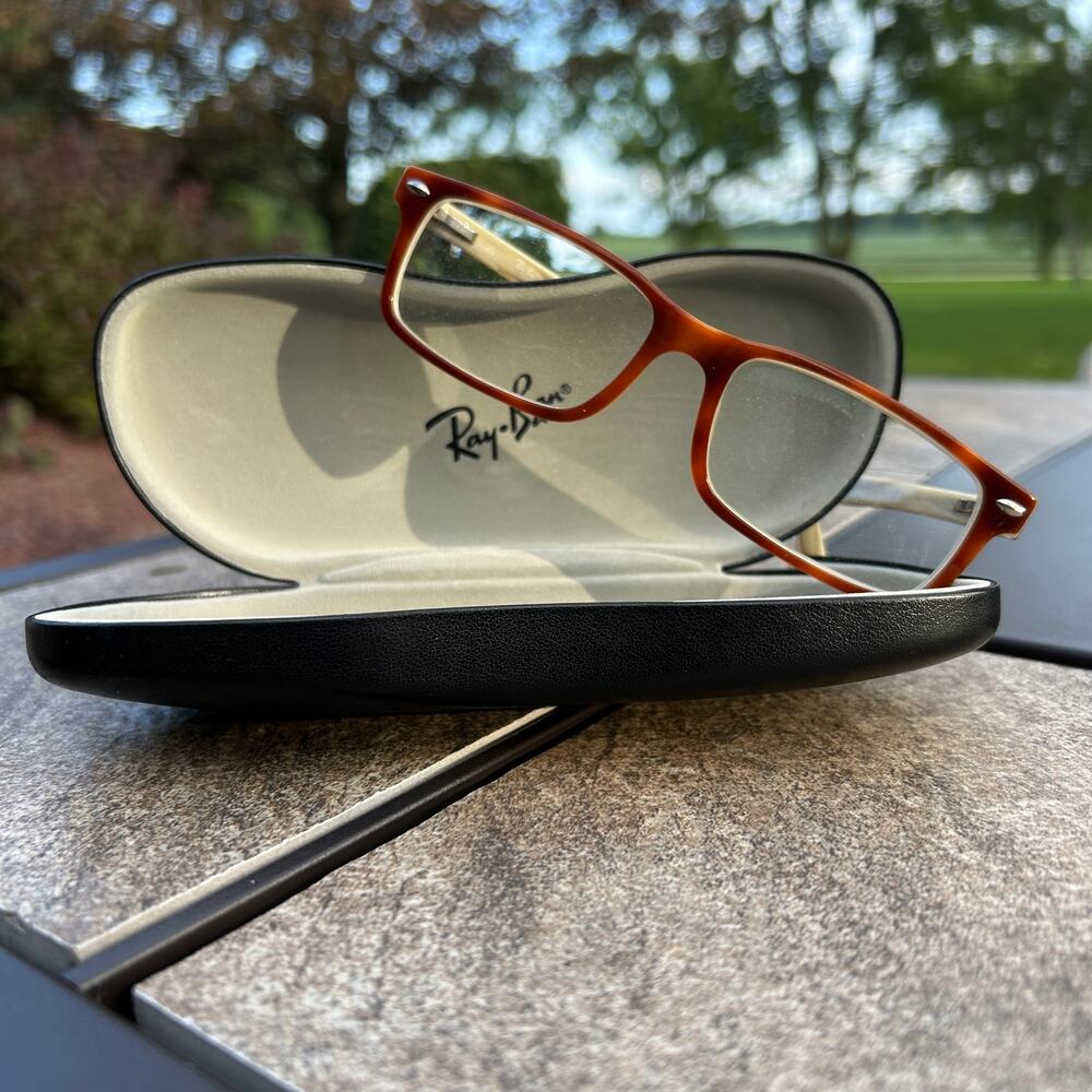 Ray-Ban RB5065 rectangular eyeglasses and hard case
Prescription lenses